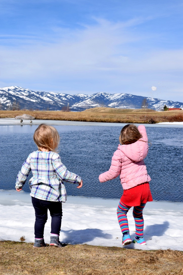 Girls Throwing Snow